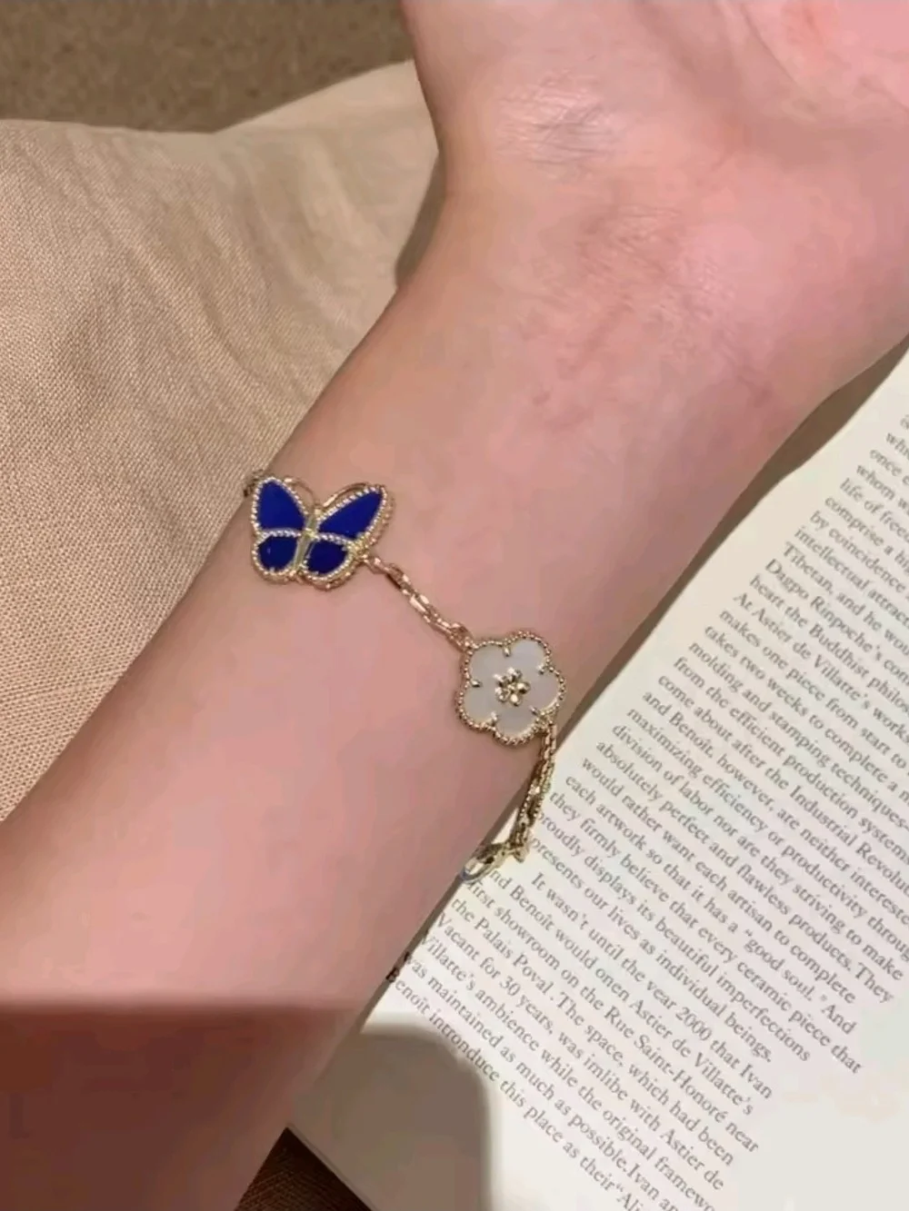 Gold Charm Bracelet with Blue Butterfly and Mother-of-Pearl Accents